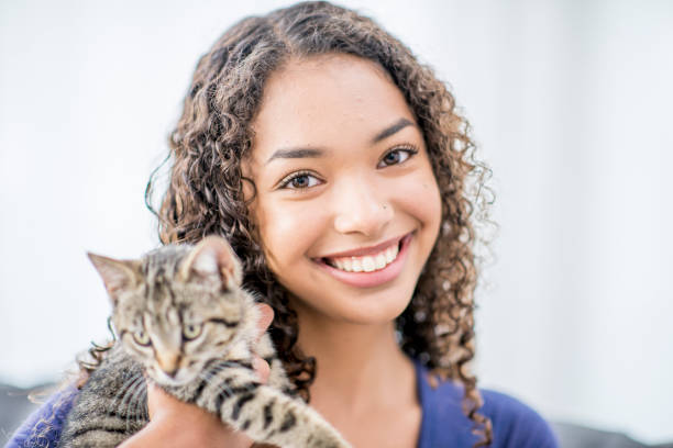 istock Happy Girl With Cat 939927008