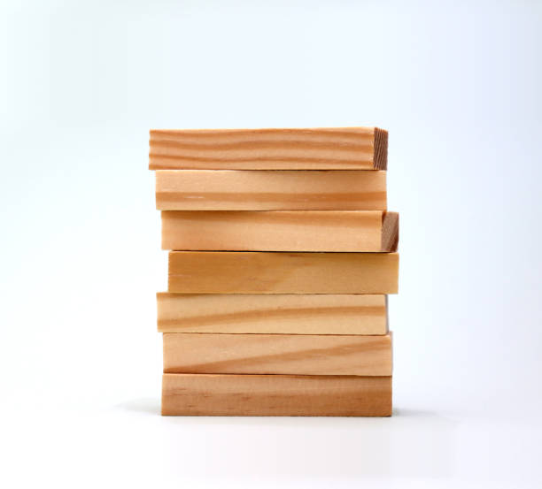 Seven wooden blocks stacked up.