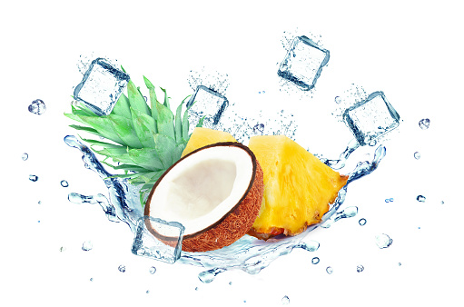coconut and pineapple splashing water and ice cubes isolated on white