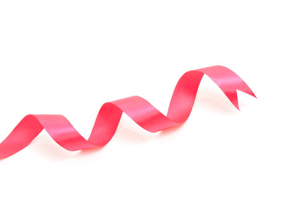 istock Pink curly ribbon isolated on white 939930964