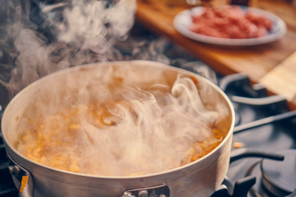 istock Preparing Homemade Spaghetti Bolognese 939934922