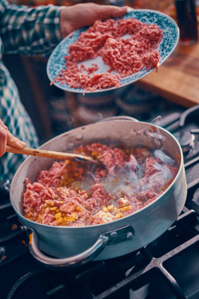 istock Preparing Homemade Spaghetti Bolognese 939934936