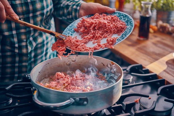 istock Preparing Homemade Spaghetti Bolognese 939934944