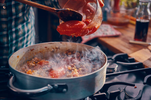 istock Preparing Homemade Spaghetti Bolognese 939934964