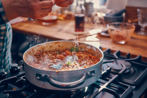istock Preparing Homemade Spaghetti Bolognese 939934970