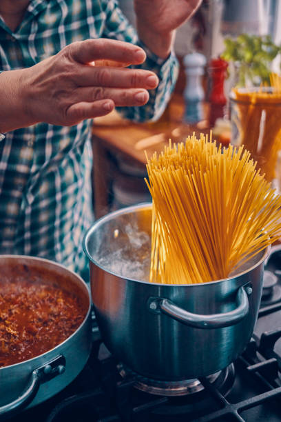 istock Preparing Homemade Spaghetti Bolognese 939934988