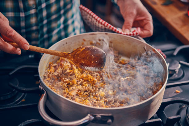 istock Preparing Homemade Spaghetti Bolognese 939935250