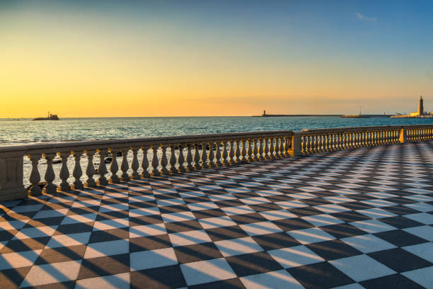 Mascagni Terrazza terrace and harbour entrance at sunset. Livorno Tuscany Italy Mascagni Terrazza terrace belvedere seafront and harbour entrance at sunset. Livorno Tuscany Italy Europe. livorno stock pictures, royalty-free photos & images