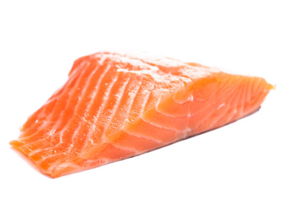 istock Single pink salmon fillet isolated on white background 939949202