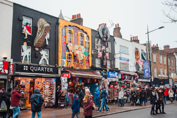 London, England - 03 March, 2018: A large group of people walking over Camden High Street in London.