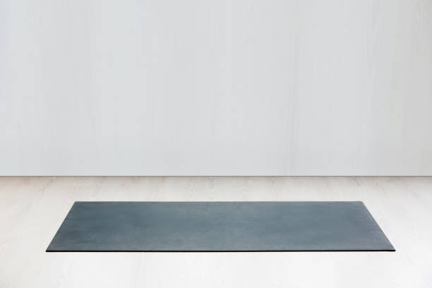 istock Gym with yoga mat on the floor 939962694