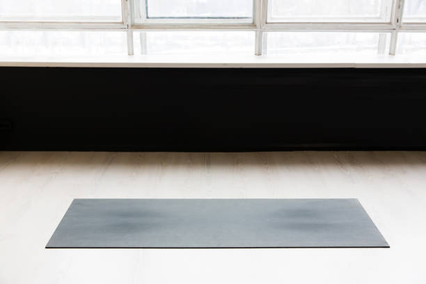 istock Gym with yoga mat interior 939962834
