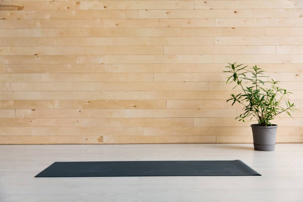 istock Gym with yoga mat on the floor 939963278