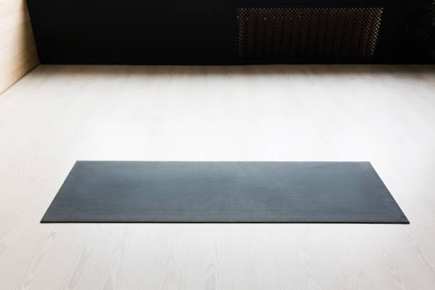 istock Gym with yoga mat on the floor 939965834