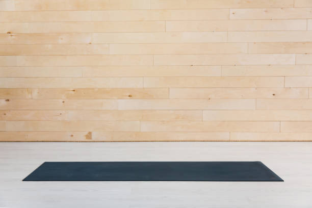 istock Gym with yoga mat interior 939965902