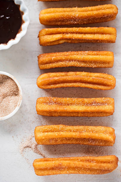 istock Churros with cinnamon sugar and chocolate sauce 939971634