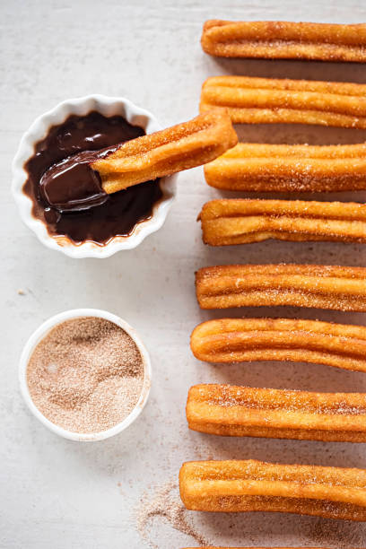 istock Churros with cinnamon sugar and chocolate sauce 939973898