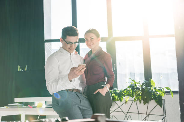 istock young businesspeople couple at modern office 939978870