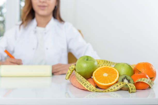 istock Dietician with healthy vegetables 939986504