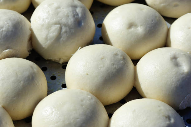 istock Chinese food steamed buns in a container 939999374