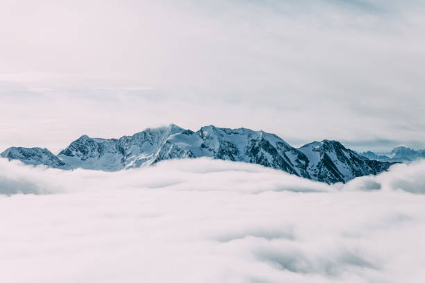 istock amazing winter mountain landscape with clouds, mayrhofen, austria 940010780