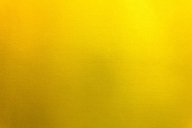 istock Shiny yellow leaf gold foil texture background. 940011442