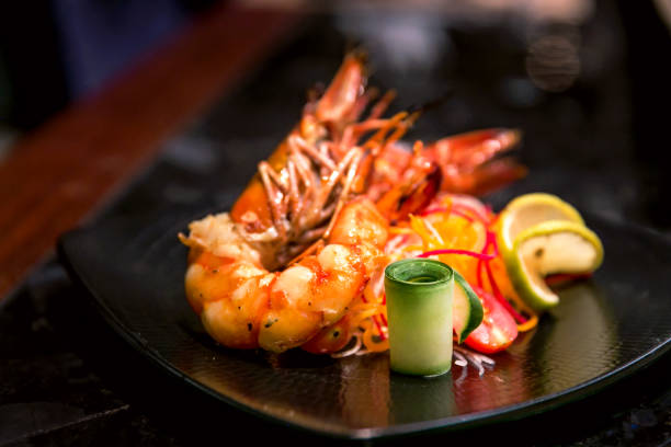 riesengarnelen grill - prepared shrimp prawn large grilled stock-fotos und bilder