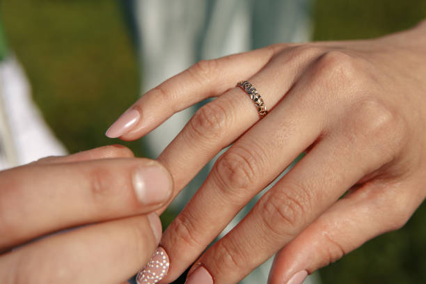 istock Man giving an engagement ring to his girlfriend 940023816