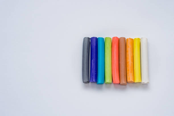 istock Still life of developing objects for children's creativity and hobbies of adults, crayon, pastel pencils isolated on white background 940030684