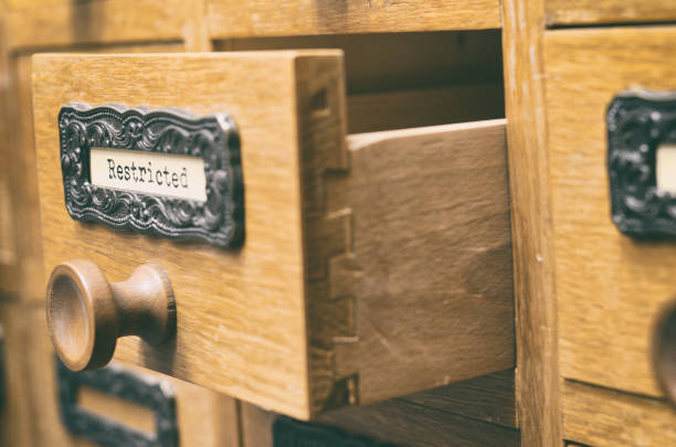 istock Old wooden archive files catalog drawer, restricted files 940031186