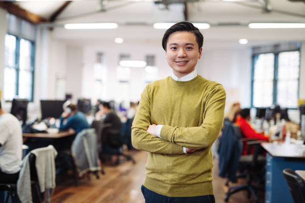 istock Determined Korean businessman in coworking hub 940034620