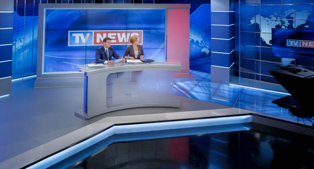 istock Newsreaders in television studio 940035164