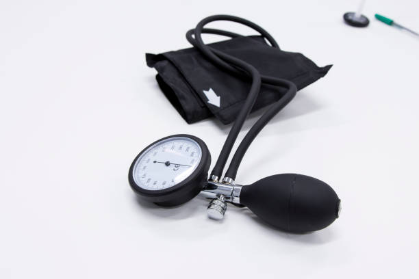 istock Sphygmomanometer or  blood-pressure cuff on a white background 940042028