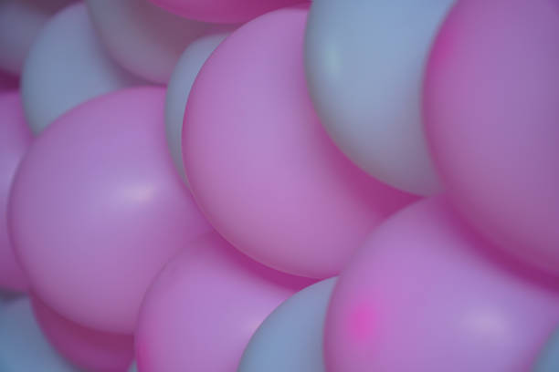 istock Pink and white pastel balloon backdrop background. 940053306