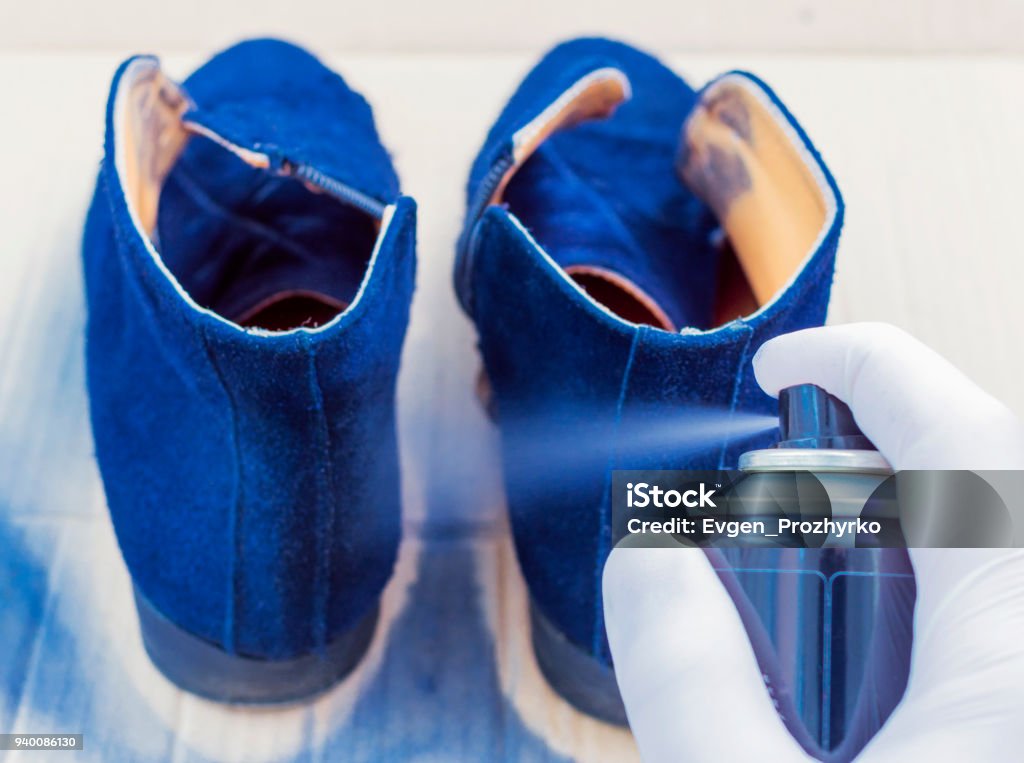 Shoe Care The Person In The White Rubber Gloves Paints With Aerosol Paint  Female Suede Boots Blue Suede Dye For Shoes Stock Photo - Download Image  Now - iStock