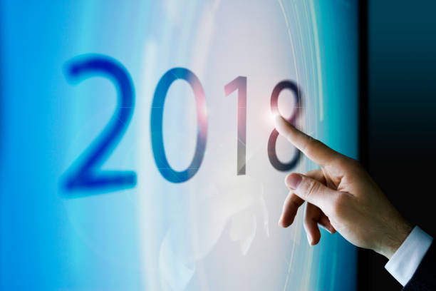 istock Businessman touching the screen about 2018 940090454