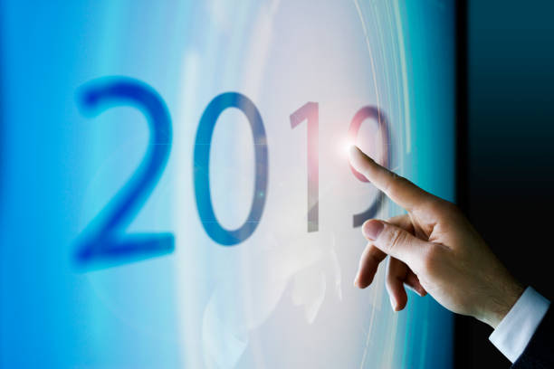 istock Businessman touching the screen about 2019 940090476