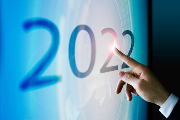 istock Businessman touching the screen about 2022 940090498