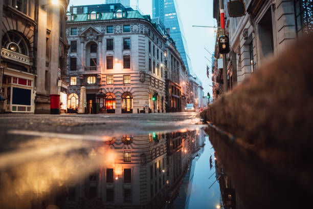 istock Street in London and reflection 940091618