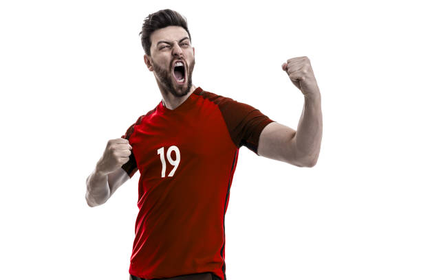 istock Fan / Sport Player on red uniform celebrating on white background 940092088