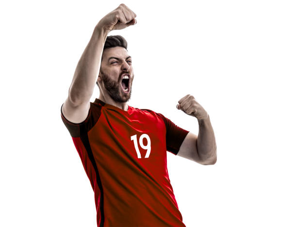 istock Fan / Sport Player on red uniform celebrating on white background 940092090