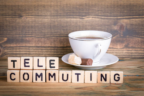 istock telecommuting. Wooden letters on the office desk, informative and communication background 940096464