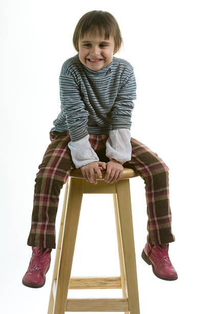 istock The girl on a high chair 94010050