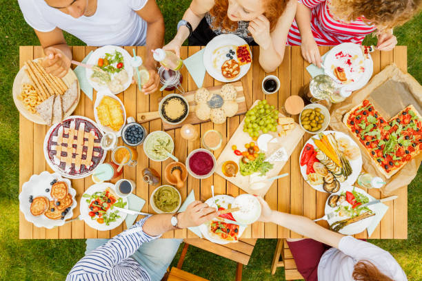 istock Group of friends sharing food 940104124