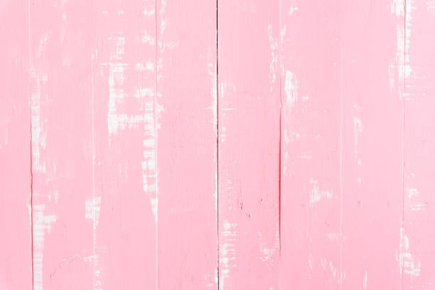 istock Pastel white and pink wooden table background texture. 940107522