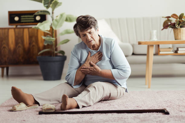 Elderly woman with heart attack Lonely elderly woman with heart attack on the floor at home osteoporosis awareness stock pictures, royalty-free photos & images
