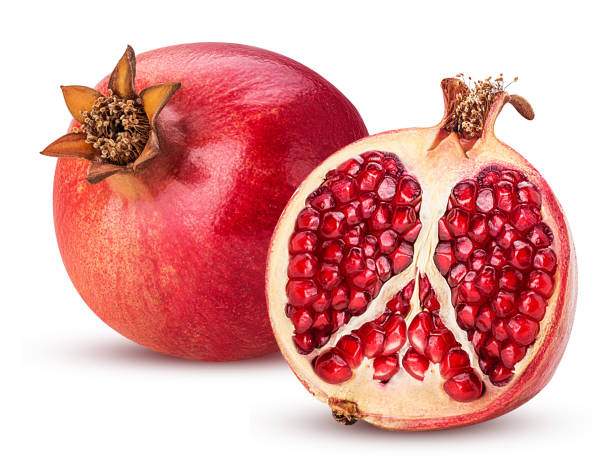 istock Ripe pomegranate fruit and one cut in half 940122668