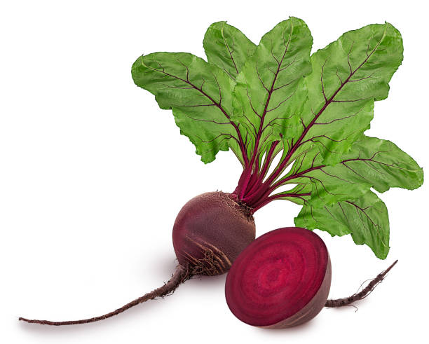 istock Fresh red beet root one whole and cut in half with green leaf 940123538