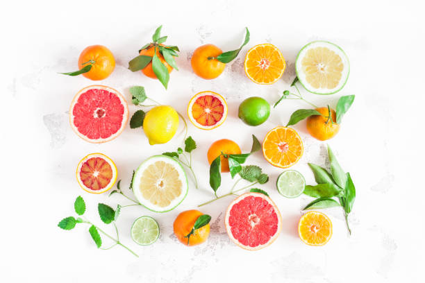istock Colorful fresh fruits on white table. Flat lay, top view 940127048