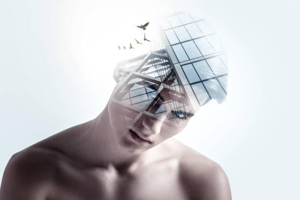 istock Promising attractive guy reaching success 940139748
